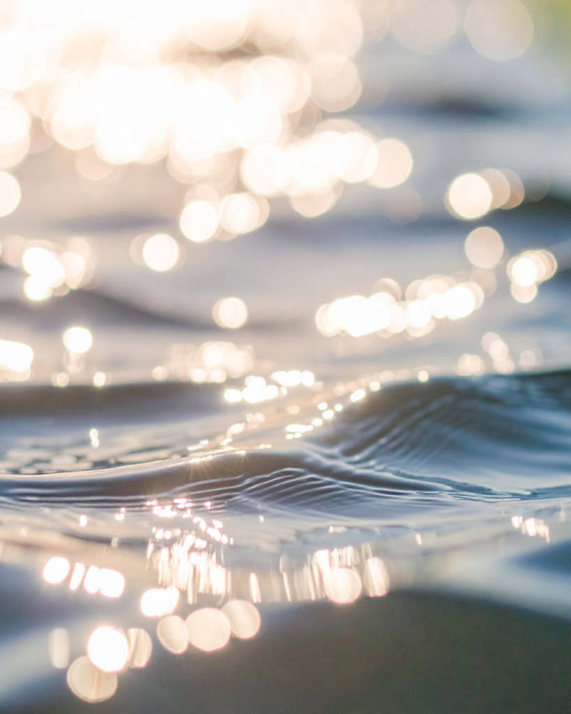 glimmers of sunshine on rippling water